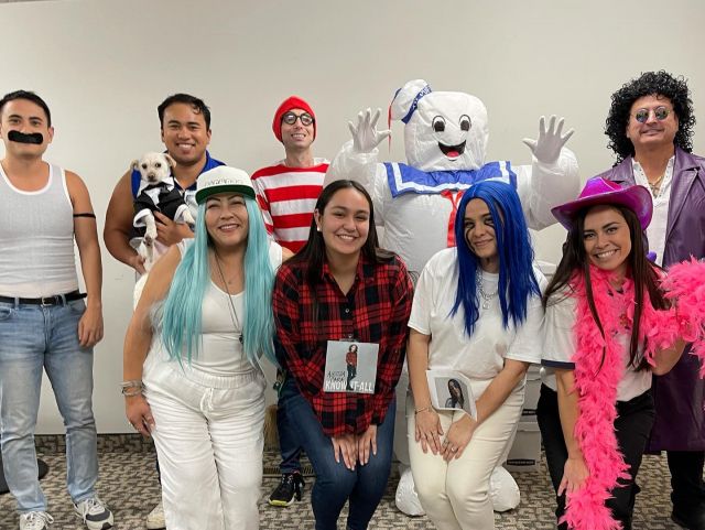 Photo of staff in Halloween costumes